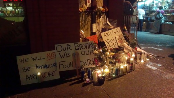 The makeshift memorial to hate crime victim Mark Carson, at 8th Street and 6th Avenue.